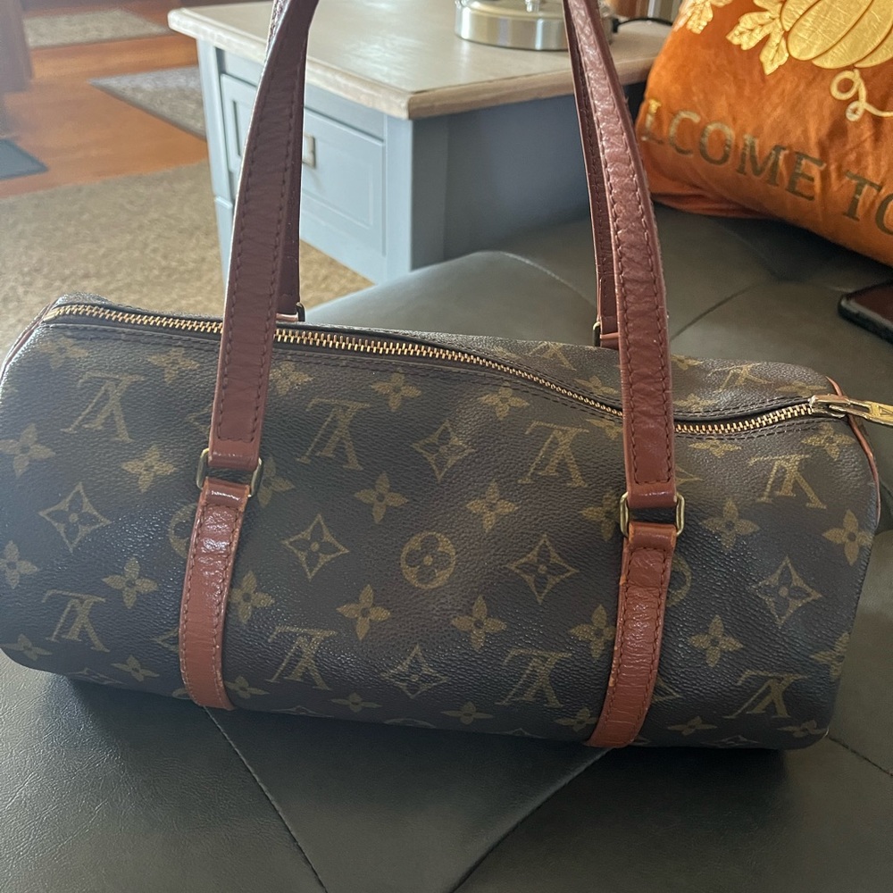 Louis Vuitton papillon. See all pics.